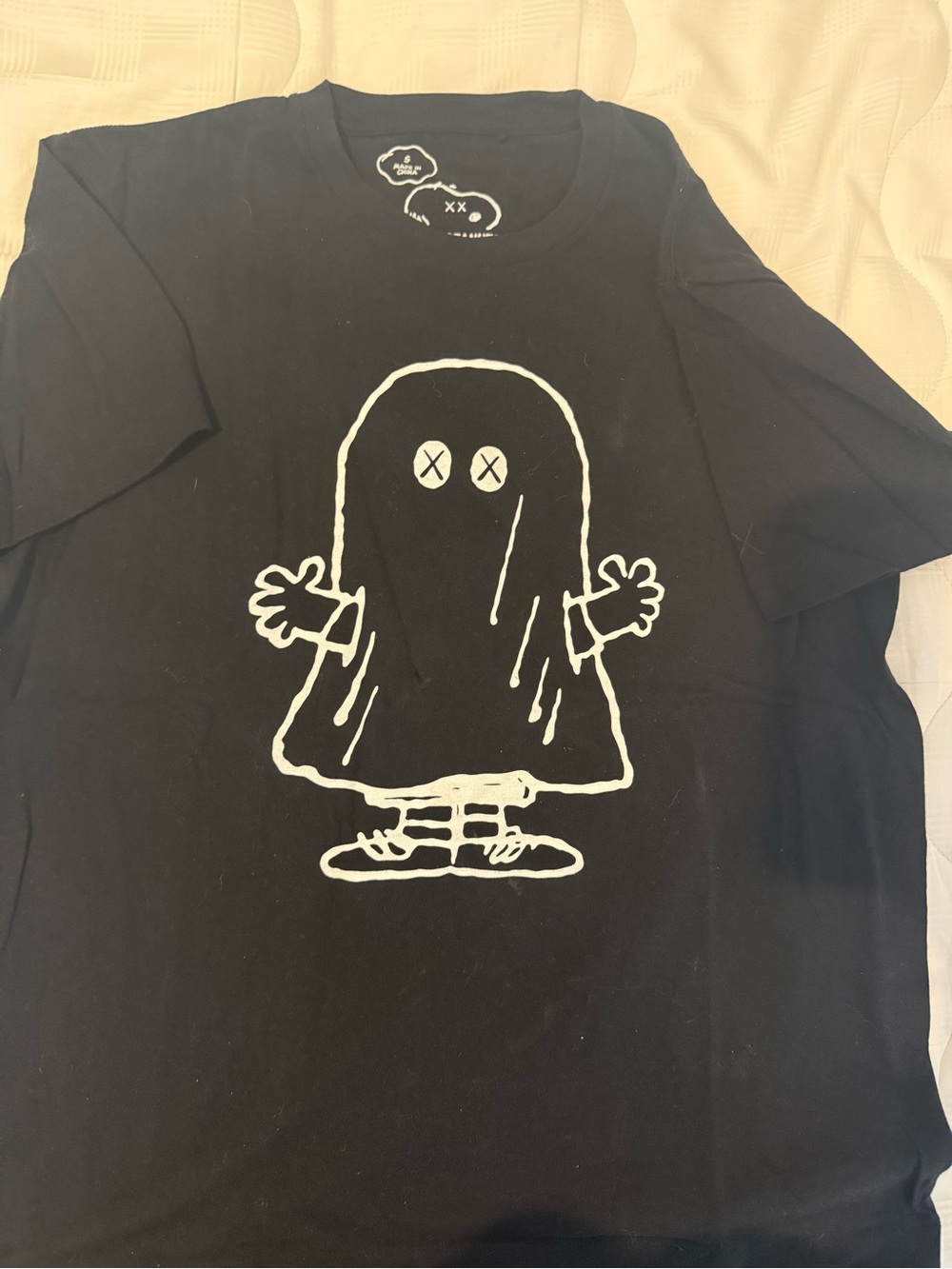 Uniqlo x KAWS Black Tee with White Ghost Graphic